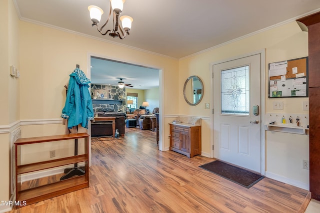 236 Wadlow Gap Rd, Kingsport, TN 37660 - entrance foyer featuring light wood-style floors, ornamental molding, a chandelier, and ceiling fan