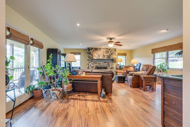 236 Wadlow Gap Rd, Kingsport, TN 37660 - living area with light wood finished floors, a ceiling fan, a stone fireplace, and recessed lighting