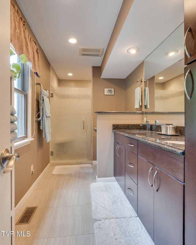 236 Wadlow Gap Rd, Kingsport, TN 37660 - full bathroom with vanity, a shower stall, and recessed lighting