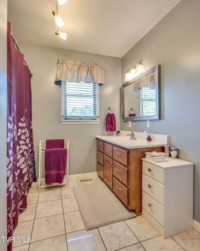 236 Wadlow Gap Rd, Kingsport, TN 37660 - bathroom featuring marble finish floors, vanity, and a shower with curtain