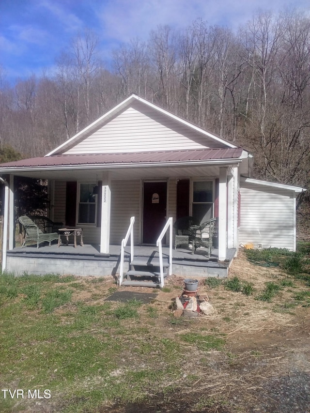 32222 Old Saltworks Rd, Meadowview, VA 24361 - view of front of home with covered porch and a metal roof