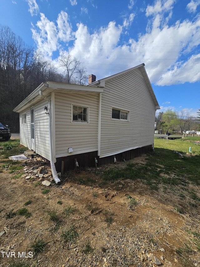 32222 Old Saltworks Rd, Meadowview, VA 24361 - view of side of property featuring a chimney