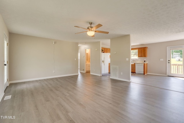 6215 Snapps Ferry Rd, Afton, TN 37616 - unfurnished living room featuring wood finished floors and ceiling fan