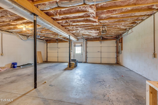 6215 Snapps Ferry Rd, Afton, TN 37616 - garage featuring electric panel and concrete block wall