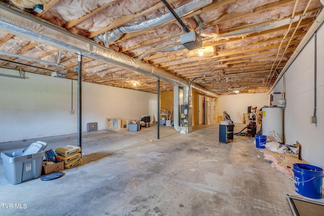 6215 Snapps Ferry Rd, Afton, TN 37616 - unfinished below grade area featuring water heater and concrete block wall
