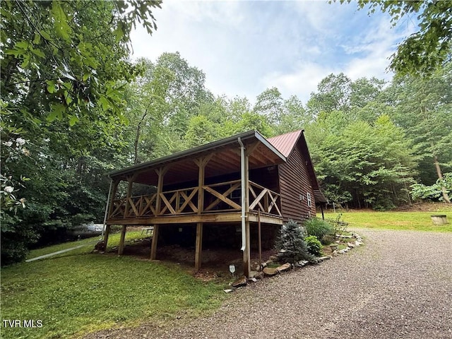 912 Hawkins Rd, Laurel Bloomery, TN 37680 - view of home's exterior with a yard, a metal roof, and a wooden deck