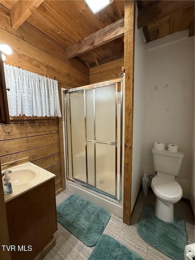 912 Hawkins Rd, Laurel Bloomery, TN 37680 - full bath featuring a wooden ceiling with exposed beams, wood walls, a stall shower, vanity, and tile patterned floors