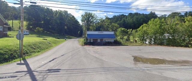 2714 Dr Thomas Walker Rd, Rose Hill, VA 24281 - view of asphalt street with traffic signs
