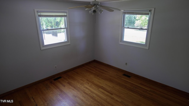 221 Timber Ridge Rd, Jonesborough, TN 37659 - spare room with plenty of natural light, wood finished floors, and ceiling fan