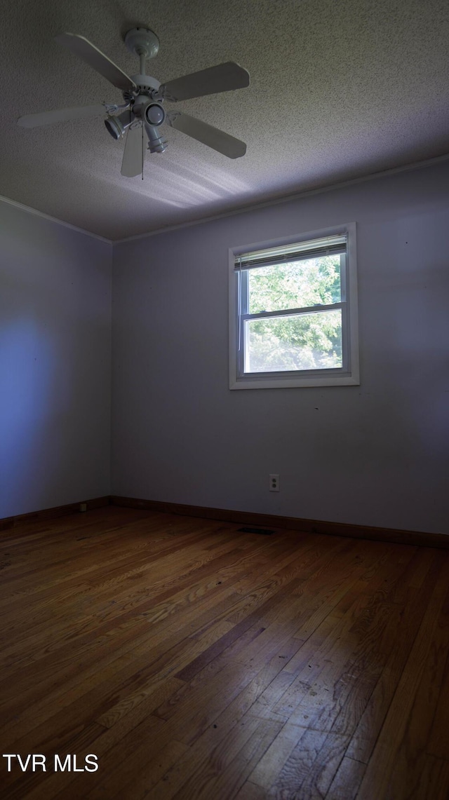 221 Timber Ridge Rd, Jonesborough, TN 37659 - unfurnished room featuring dark wood-type flooring, a textured ceiling, and a ceiling fan