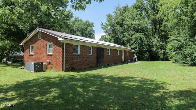 221 Timber Ridge Rd, Jonesborough, TN 37659 - view of side of property featuring a yard, brick siding, and a metal roof