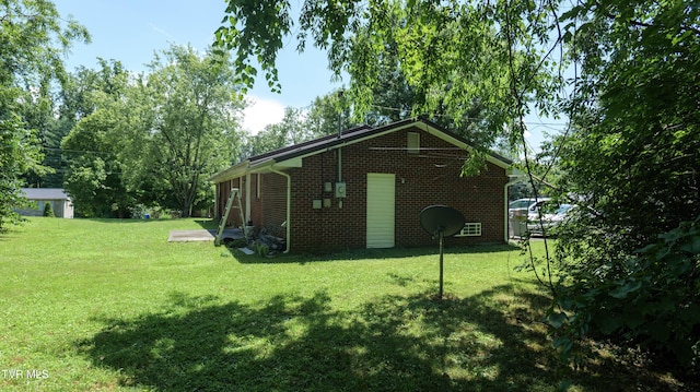 221 Timber Ridge Rd, Jonesborough, TN 37659 - view of side of property with brick siding and a yard