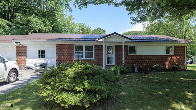 221 Timber Ridge Rd, Jonesborough, TN 37659 - single story home featuring brick siding, a front yard, and a metal roof