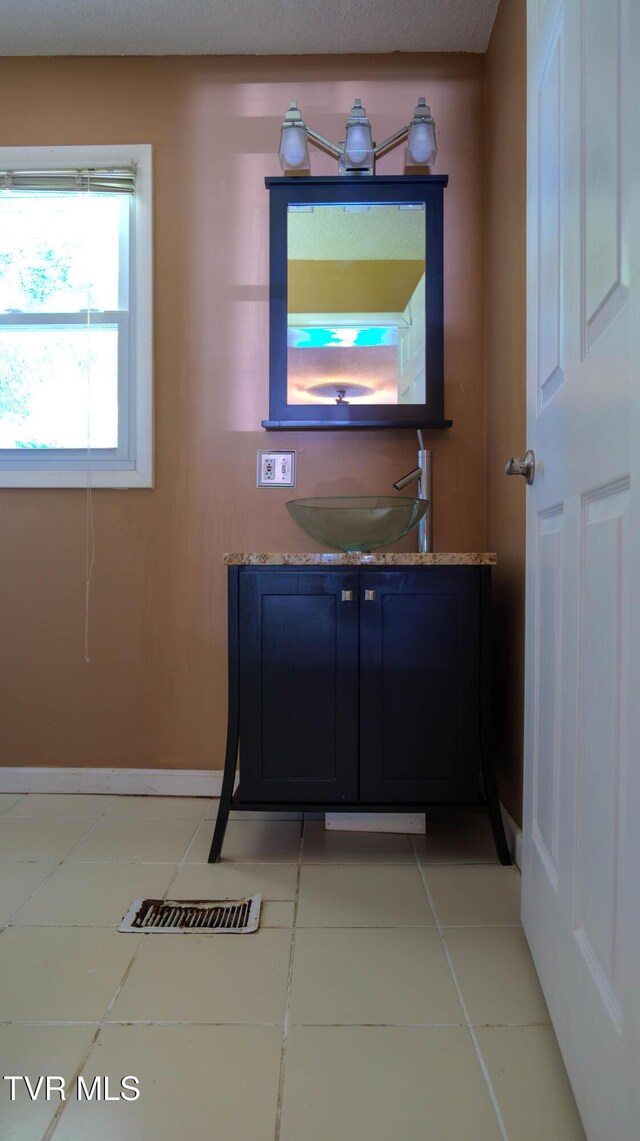 221 Timber Ridge Rd, Jonesborough, TN 37659 - bathroom with vanity and tile patterned flooring