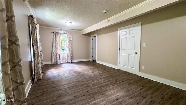542 Sigman Hollow Rd, Bluff City, TN 37618 - empty room with ornamental molding, a textured ceiling, dark wood-style flooring, and a smoke detector