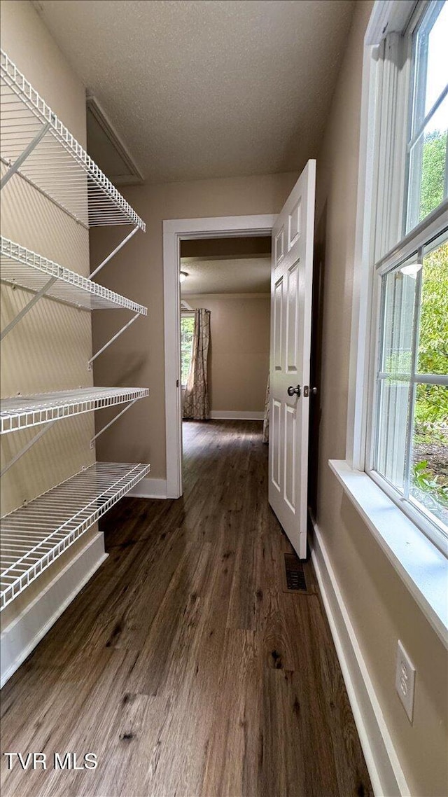 542 Sigman Hollow Rd, Bluff City, TN 37618 - hallway featuring wood finished floors and baseboards