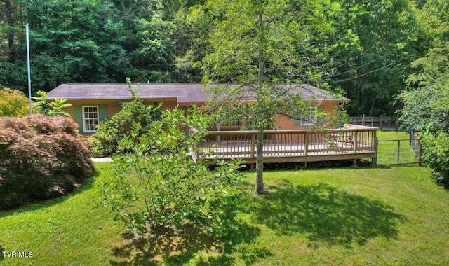 542 Sigman Hollow Rd, Bluff City, TN 37618 - rear view of property featuring a wooden deck and a view of trees