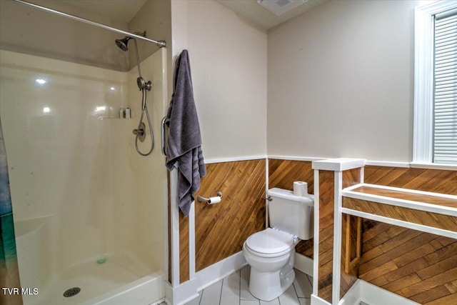 542 Sigman Hollow Rd, Bluff City, TN 37618 - full bath featuring walk in shower, wainscoting, tile patterned floors, and wood walls