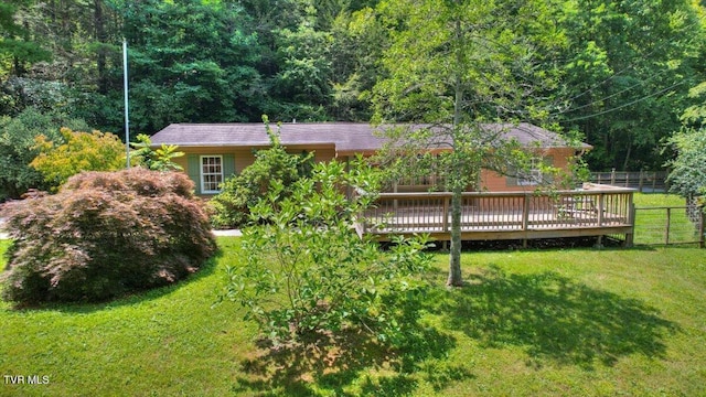 542 Sigman Hollow Rd, Bluff City, TN 37618 - back of house featuring a wooden deck and a wooded view