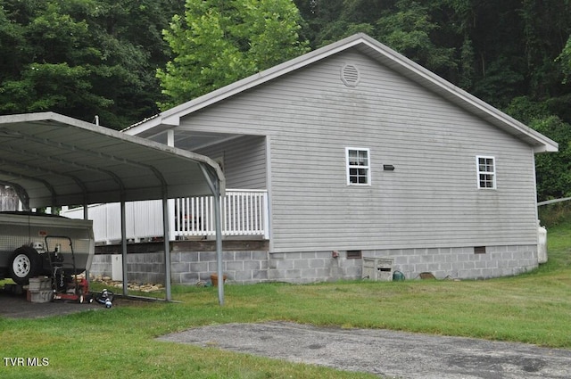 7125 Indian Creek Rd, Wise, VA 24293 - view of property exterior with crawl space, a carport, and a lawn