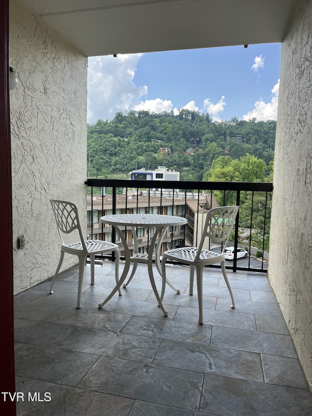 102 Baskins Creek Byp Unit 209, Gatlinburg, TN 37738 - balcony with a view of trees