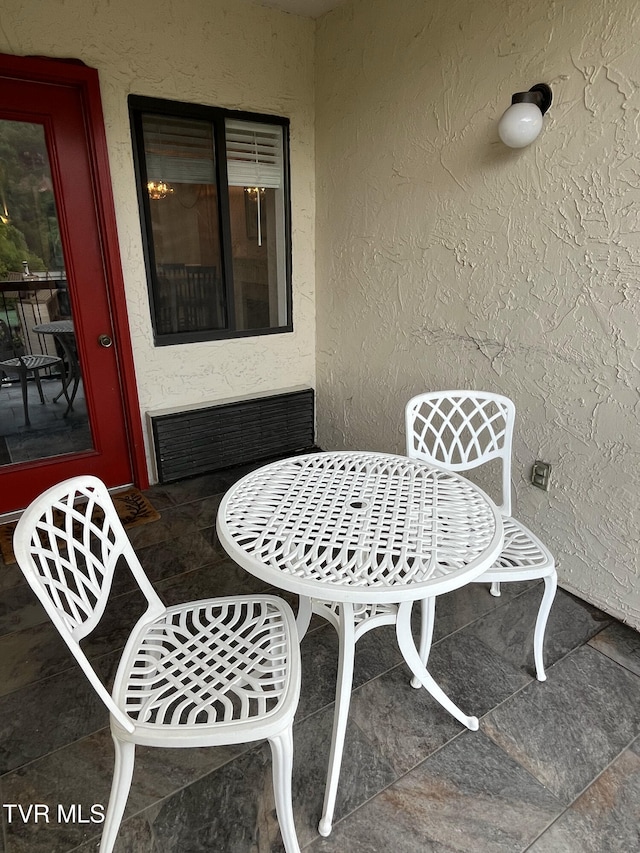 102 Baskins Creek Byp Unit 209, Gatlinburg, TN 37738 - view of patio / terrace with radiator and outdoor dining area