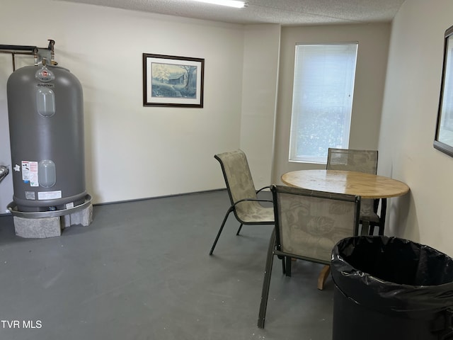 102 Baskins Creek Byp Unit 209, Gatlinburg, TN 37738 - dining area with finished concrete flooring and electric water heater
