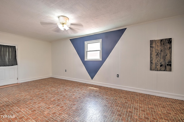 8822 Rich Valley Rd, Bristol, VA 24202 - empty room with brick patterned floors, ornamental molding, a textured ceiling, and a ceiling fan