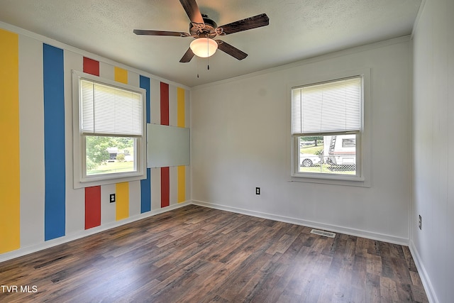 8822 Rich Valley Rd, Bristol, VA 24202 - spare room featuring ornamental molding, dark wood-type flooring, a textured ceiling, and a ceiling fan