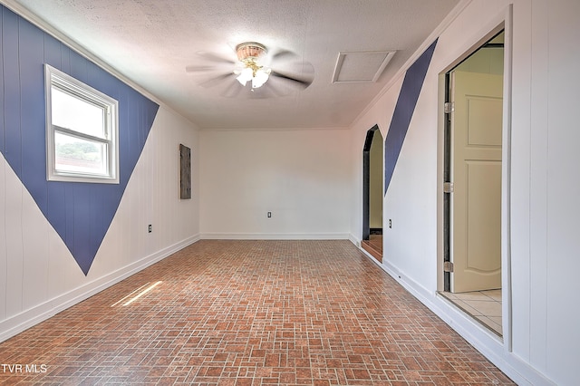 8822 Rich Valley Rd, Bristol, VA 24202 - unfurnished room with brick patterned flooring, a ceiling fan, a textured ceiling, and ornamental molding