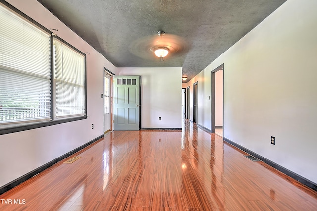 8822 Rich Valley Rd, Bristol, VA 24202 - unfurnished room with wood finished floors and baseboards