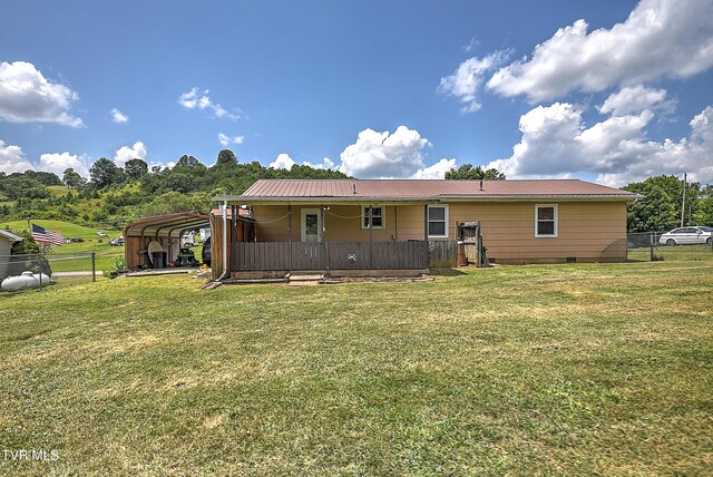 8822 Rich Valley Rd, Bristol, VA 24202 - back of house featuring a carport, crawl space, and a metal roof