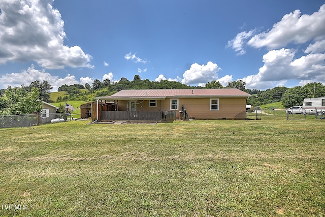 8822 Rich Valley Rd, Bristol, VA 24202 - rear view of property featuring a fenced backyard, a metal roof, and a deck