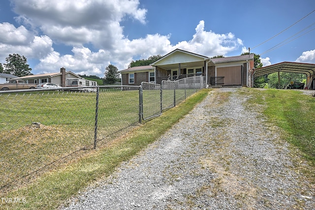 8822 Rich Valley Rd, Bristol, VA 24202 - ranch-style house with driveway, brick siding, and a carport