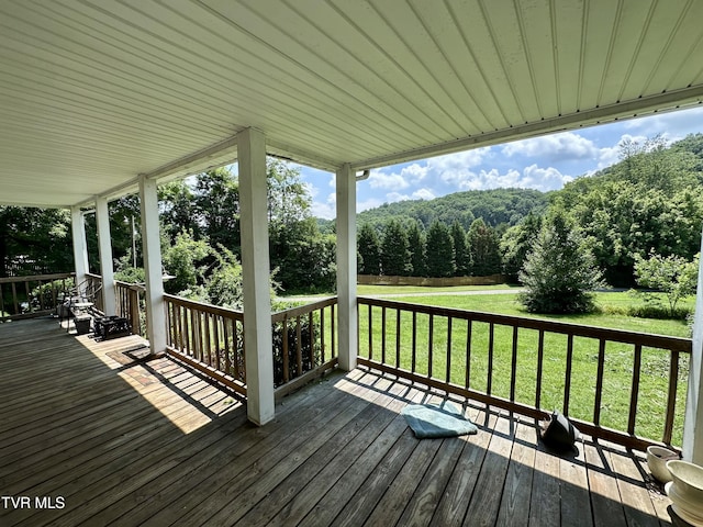 1277 Old Jonesboro Rd, Bristol, TN 37620 - wooden deck featuring a lawn and a view of trees