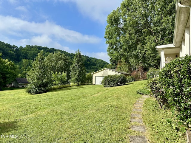1277 Old Jonesboro Rd, Bristol, TN 37620 - view of green lawn with a detached garage