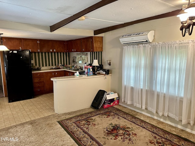 1277 Old Jonesboro Rd, Bristol, TN 37620 - kitchen with freestanding refrigerator, a wall mounted AC, beam ceiling, light countertops, and a peninsula