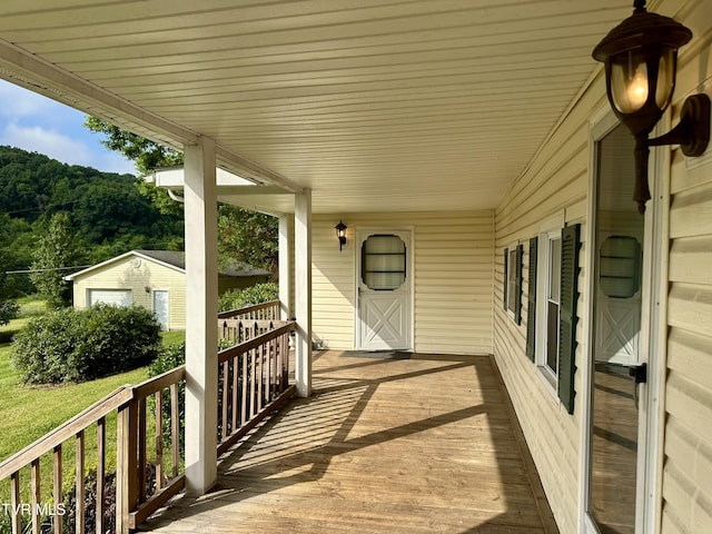 1277 Old Jonesboro Rd, Bristol, TN 37620 - wooden porch with an outbuilding