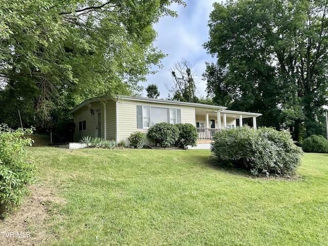 1277 Old Jonesboro Rd, Bristol, TN 37620 - view of front of property with covered porch and a front lawn