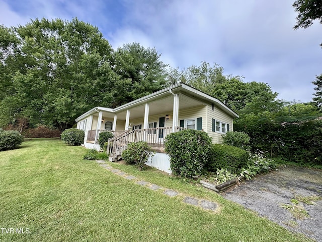 1277 Old Jonesboro Rd, Bristol, TN 37620 - view of front facade featuring a porch and a front yard