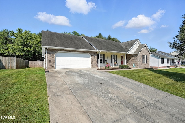 1014 Fox Meadow Cir, Bluff City, TN 37618 - ranch-style home with brick siding, covered porch, driveway, an attached garage, and roof with shingles