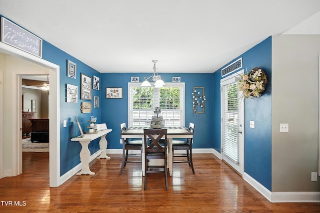1014 Fox Meadow Cir, Bluff City, TN 37618 - dining space with wood finished floors and a chandelier