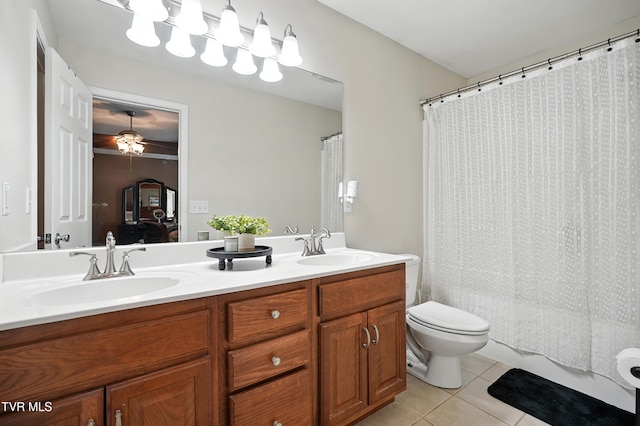 1014 Fox Meadow Cir, Bluff City, TN 37618 - ensuite bathroom with tile patterned flooring, double vanity, and a ceiling fan
