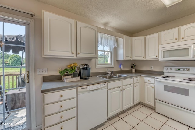 147 Rainbow Cir Unit 147, Bristol, VA 24202 - kitchen featuring white appliances, white cabinets, a textured ceiling, and light tile patterned floors