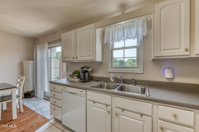 147 Rainbow Cir Unit 147, Bristol, VA 24202 - kitchen with dishwasher, white cabinetry, a textured ceiling, and light wood-style flooring