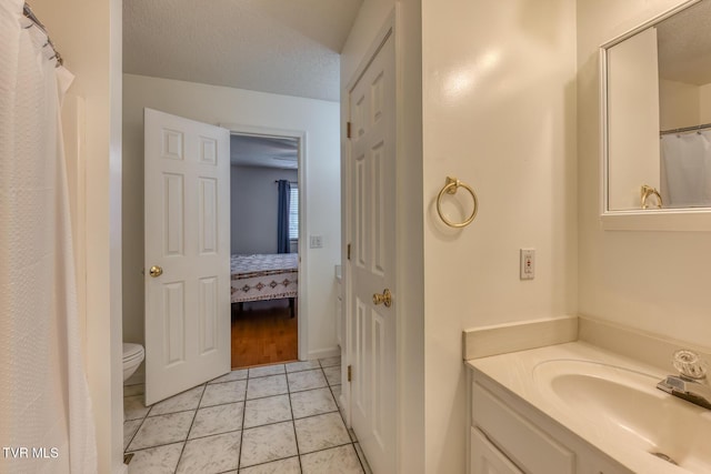 147 Rainbow Cir Unit 147, Bristol, VA 24202 - full bathroom featuring vanity, tile patterned flooring, and ensuite bathroom