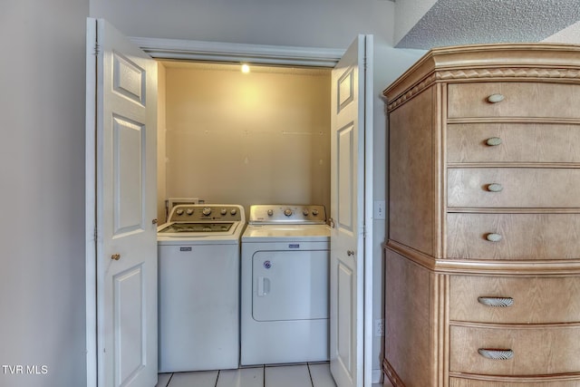 147 Rainbow Cir Unit 147, Bristol, VA 24202 - laundry room with washing machine and clothes dryer and light tile patterned floors