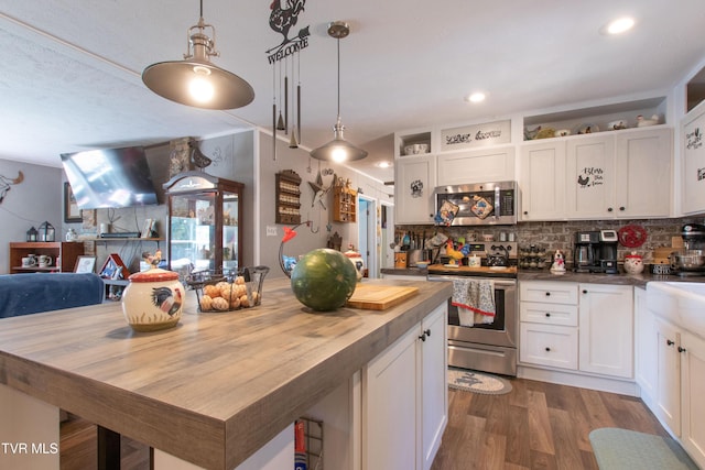 22720 Twin Oaks Rd, Abingdon, VA 24211 - kitchen featuring appliances with stainless steel finishes, decorative backsplash, white cabinets, dark wood finished floors, and wooden counters