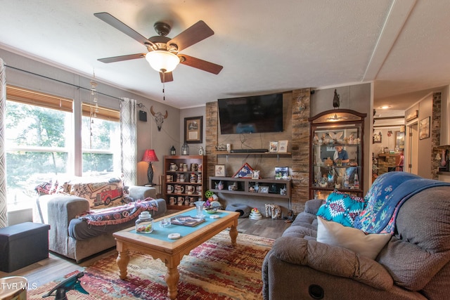 22720 Twin Oaks Rd, Abingdon, VA 24211 - living area featuring wood finished floors, ceiling fan, and ornamental molding