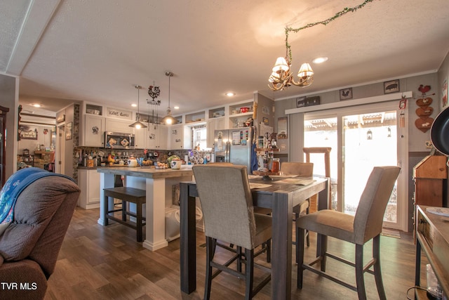22720 Twin Oaks Rd, Abingdon, VA 24211 - dining area with plenty of natural light, a chandelier, dark wood finished floors, recessed lighting, and ornamental molding